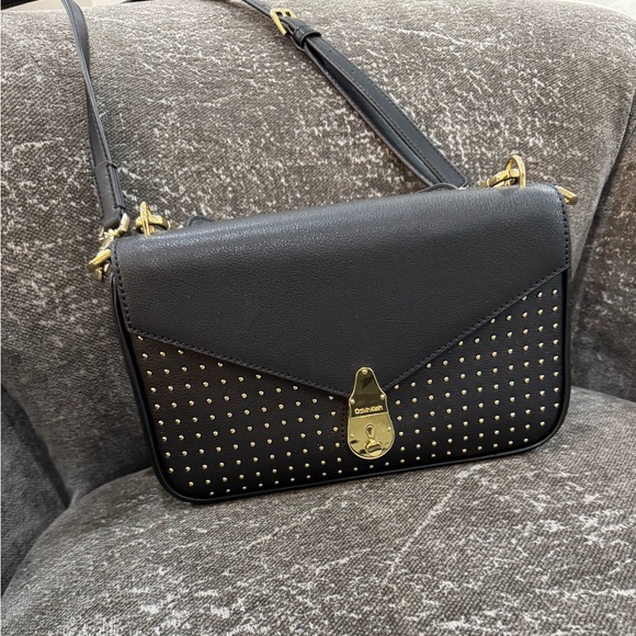 Calvin Klein Handbags - Calvin Klein Black Crossbody Bag with Gold Accents